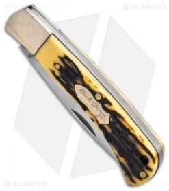 Uncle Henry 2 Piece Fixed Blade/Folder/Pen/Key Fob Tin -SOG Store Uncle Henry 2pc Fixed Folder Tin With Pen Keychain BHQ 123472 td knife 1 spine